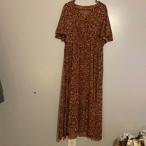Long Burgundy dress. Never worn it.has an elastic waist band and is floor length